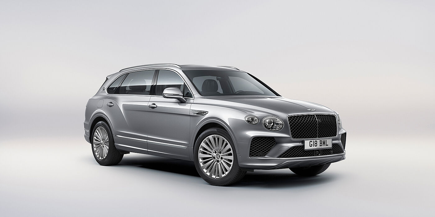 Bentley Oslo Bentley Bentayga Extended Wheelbase luxury SUV front three quarter view in Moonbeam paint with 21 inch five spoke painted wheels