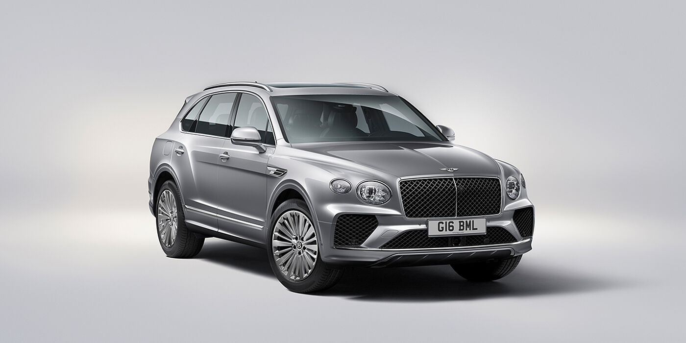 Bentley Oslo Bentley Bentayga luxury SUV front three quarter view in Moonbeam paint with matrix grille and 21″ 5 spoke painted wheels