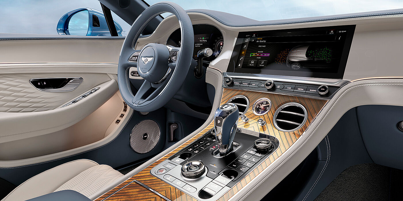 Bentley Oslo New Bentley Continental GTC Azure convertible interior front cabin view with Linen and Brunel hides and Piano Linen by Mulliner veneer featuring centre console and centre MMI screen